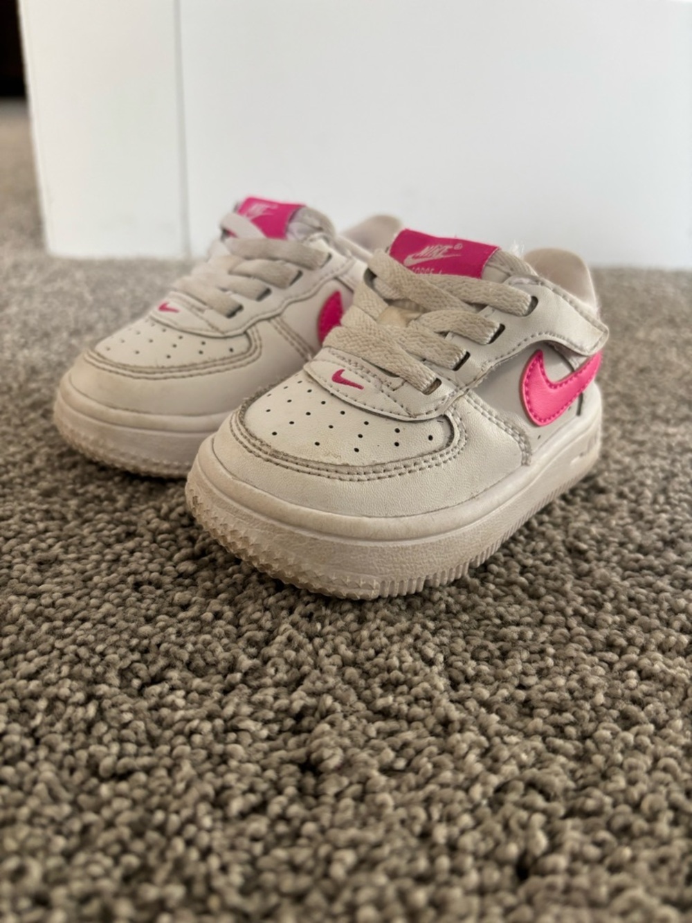 Nike Kids White Sneaker with Pink Swoosh